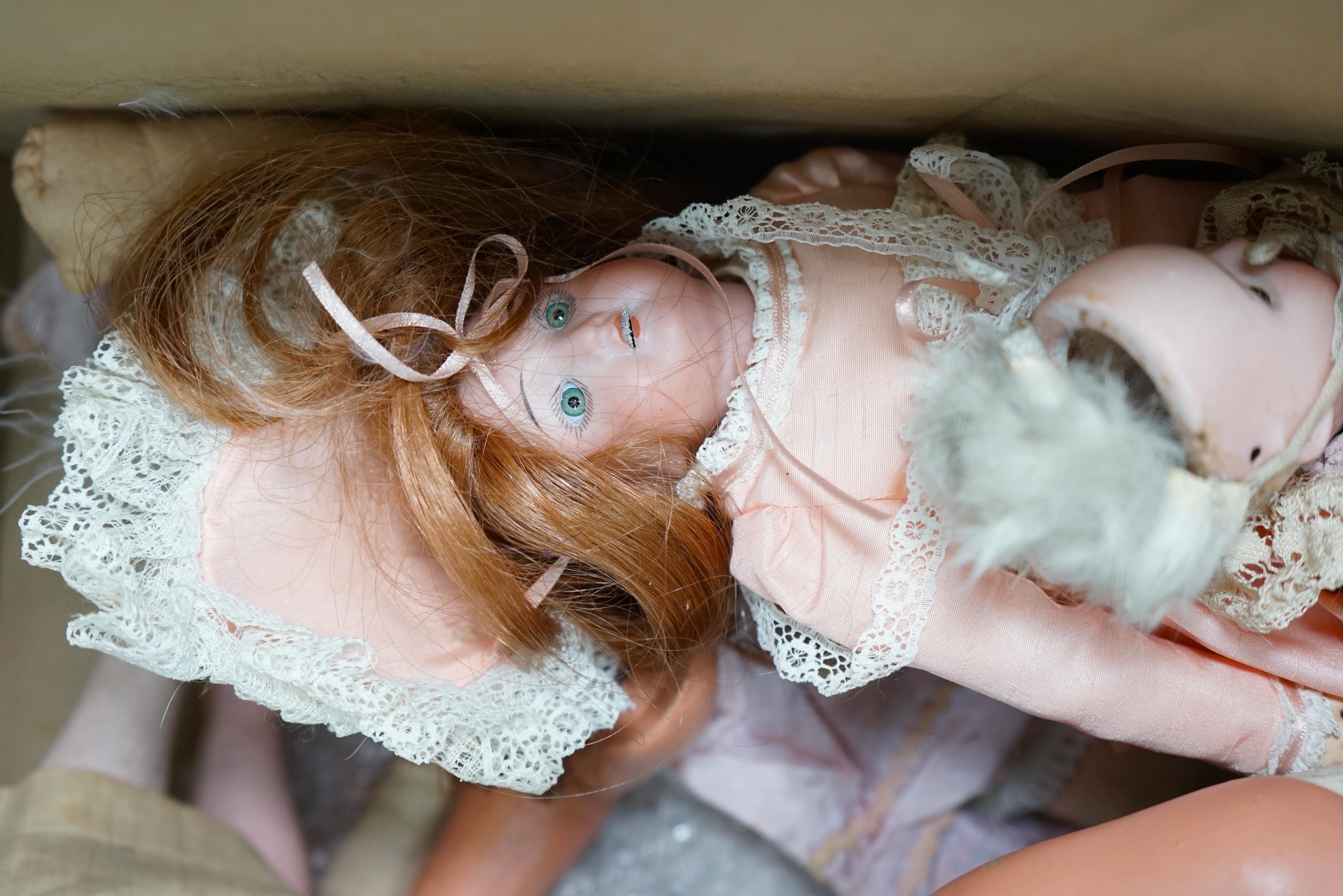 An Armand Marseille bisque doll, mould 390, a small Hermann Steiner bisque doll, three other bisque dolls including an SFBJ 60, and four composition dolls, Armand Marseille 33cm. Condition - poor to fair